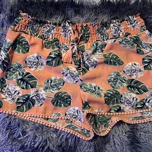 Large super comfy orange and green shorts very good condition